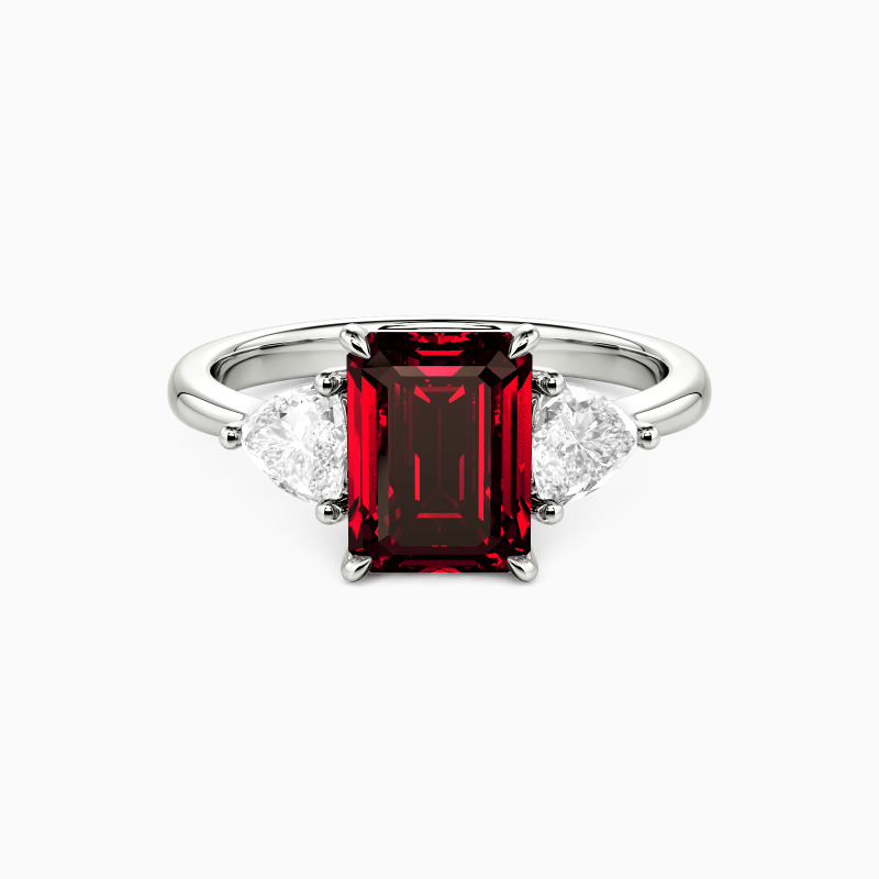 "Through the Ages" Emerald Cut Three Stone Engagement Ring