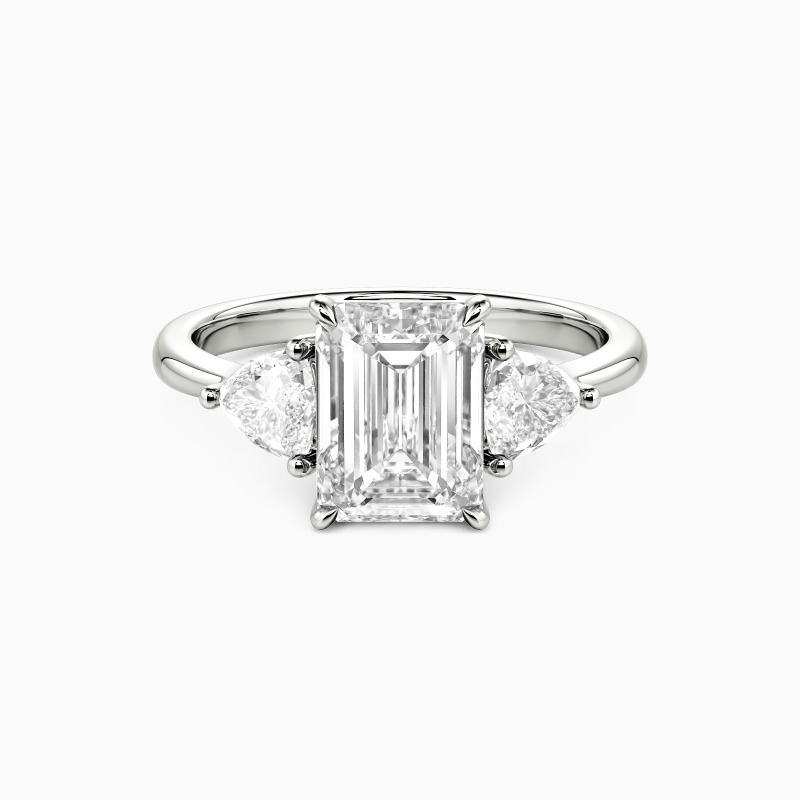 "Through the Ages" Emerald Cut Three Stone Engagement Ring