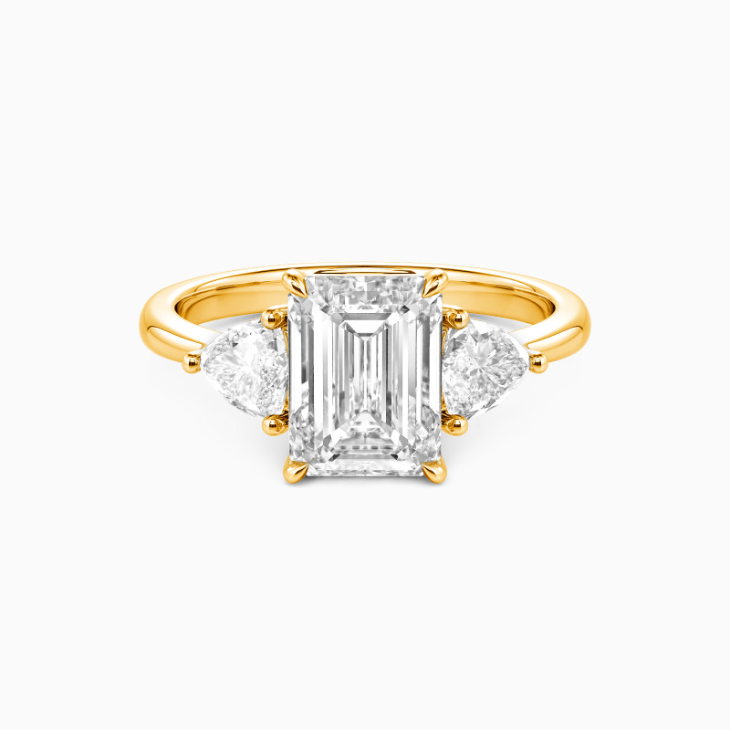 "Through the Ages" Emerald Cut Three Stone Engagement Ring