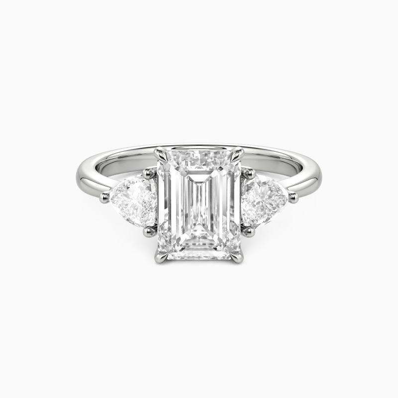 "Through the Ages" Emerald Cut Three Stone Engagement Ring