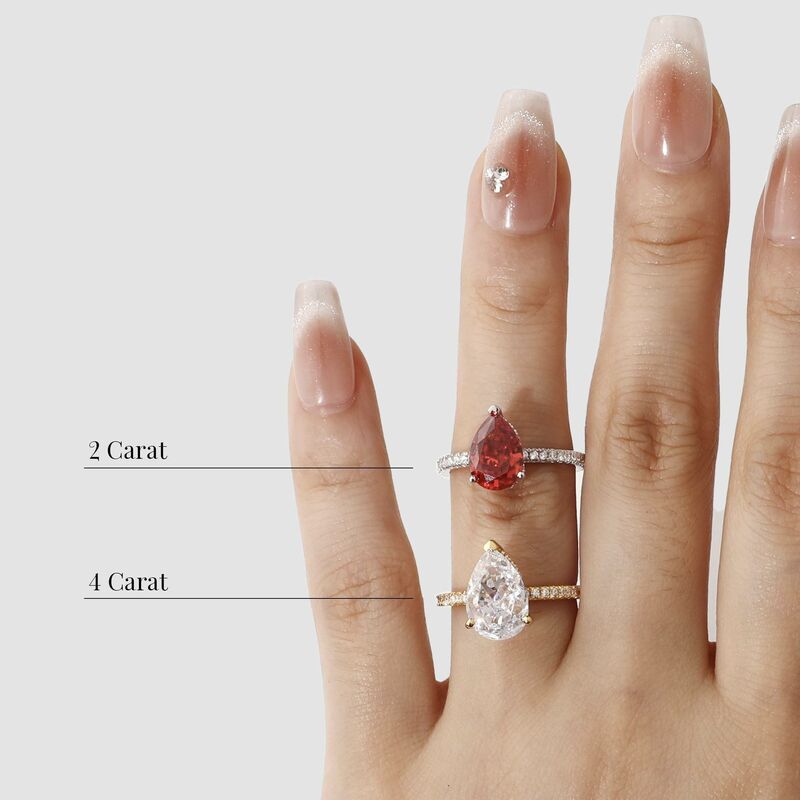 "Yours, Always" 4ct Pear Cut Side Stone Engagement Ring