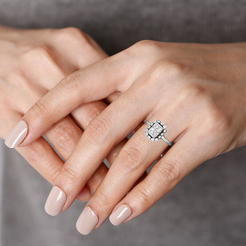 "Hopeful Future" Emerald Cut Halo Engagement Ring