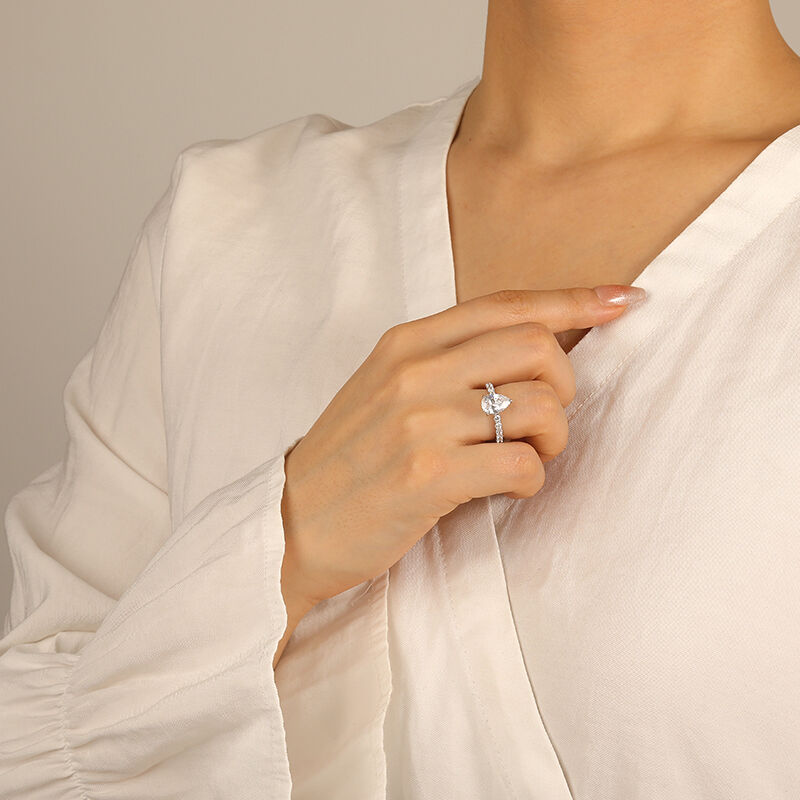 "There for You" Pear Cut Side Stone Engagement Ring