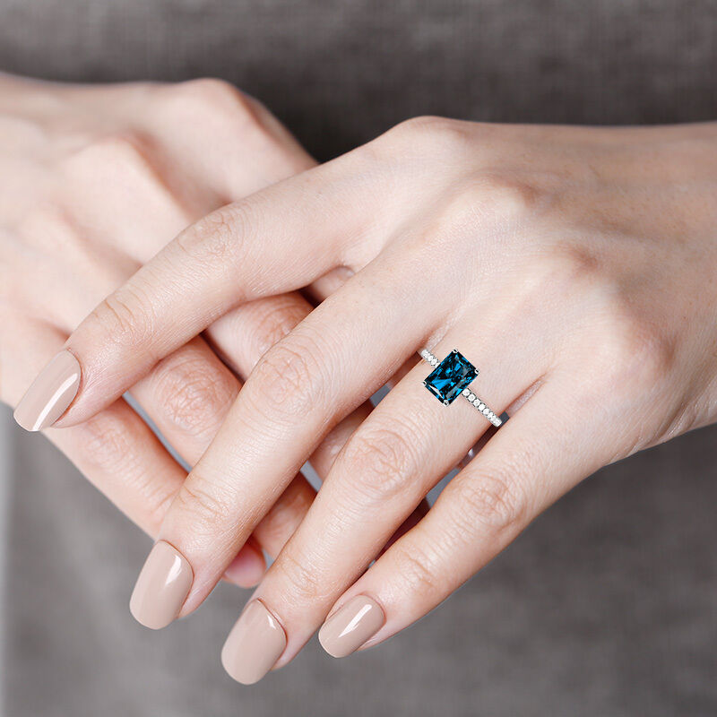 "Yours Completely" 4ct Radiant Cut Side Stone Engagement Ring