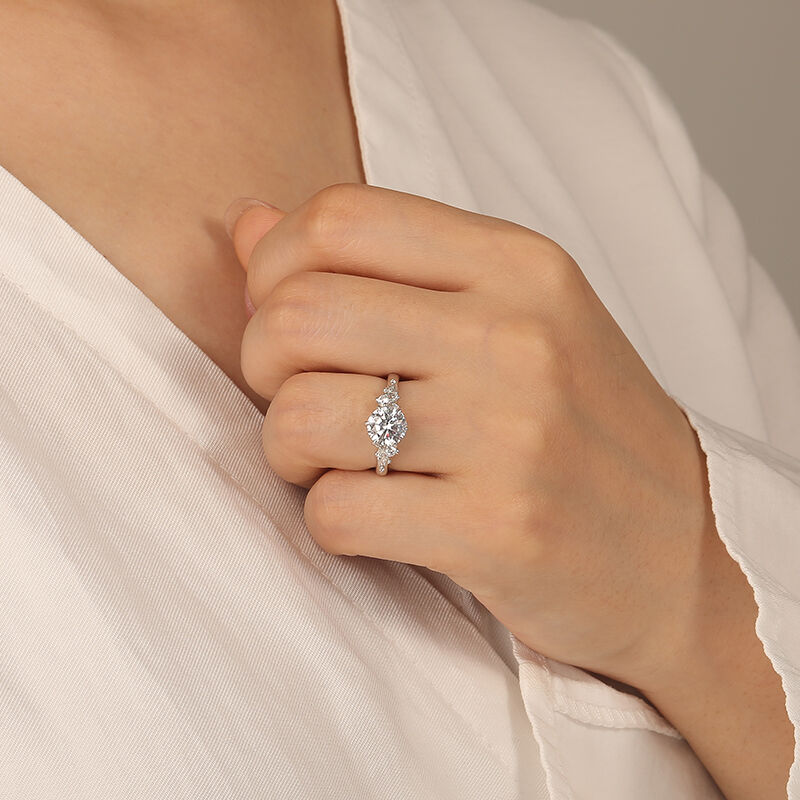 "Stay by Your Side" Round Cut Side Stone Engagement Ring