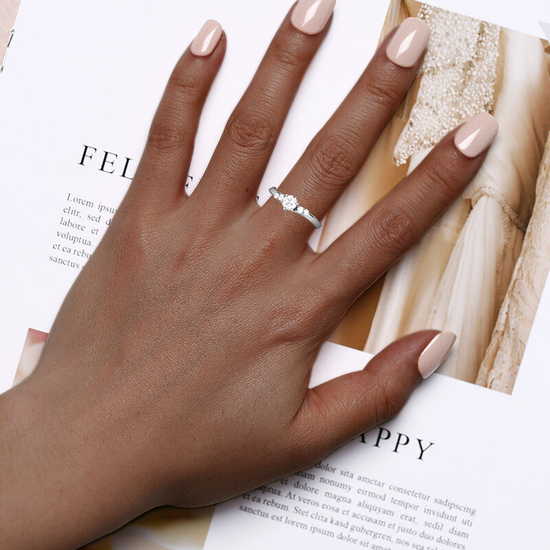 "Two Halves, One Whole" Round Cut Side Stone Engagement Ring