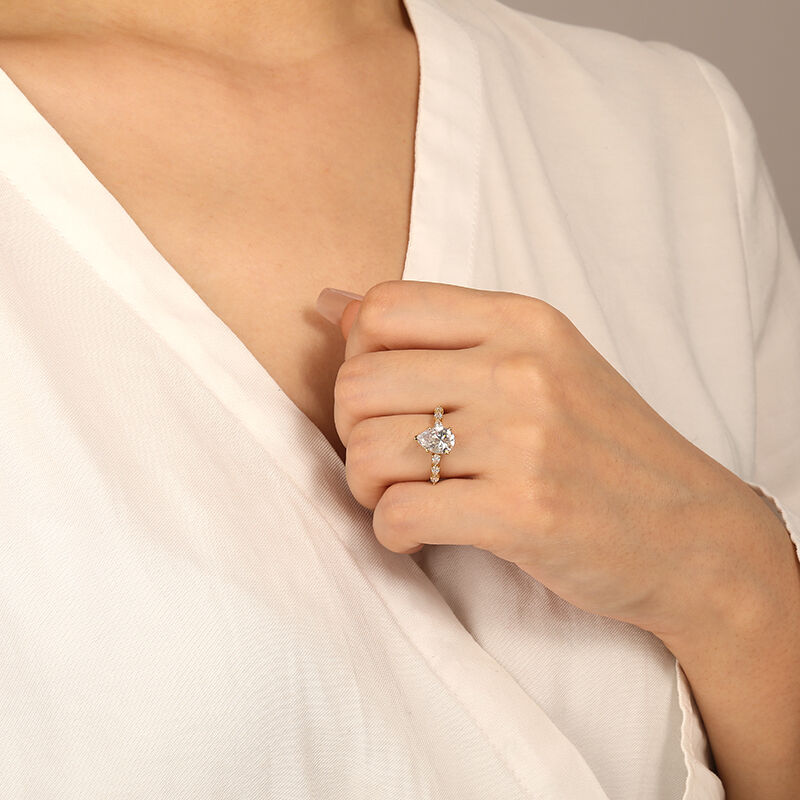 "A Tear-drop of Love" Pear Cut Side Stone Engagement Ring