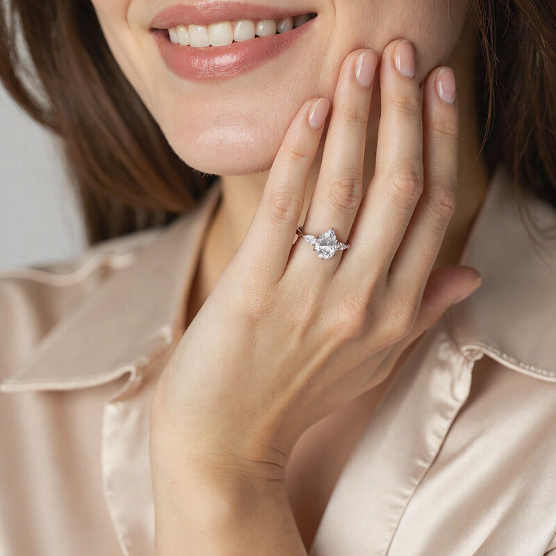 "Never-ending Story" Pear Cut Three Stone Engagement Ring