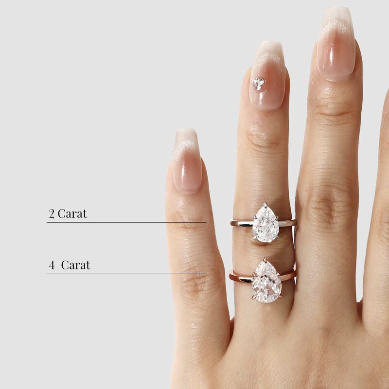 "Promise Me Forever" 4ct Pear Cut Side Stone Engagement Ring