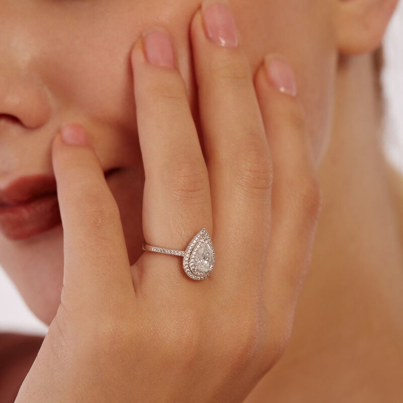 "You Are The World" Pear Cut Halo Engagement Ring