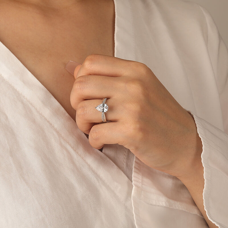 "Just Us" Pear Cut Side Stone Engagement Ring