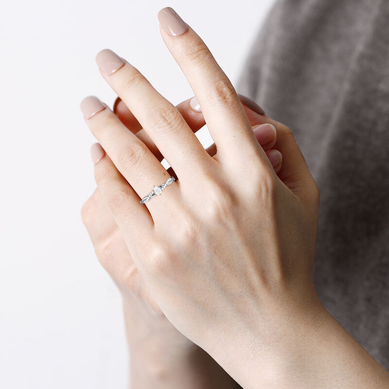 "Word of Honor" 0.3ct Pear Cut Side Stone Engagement Ring
