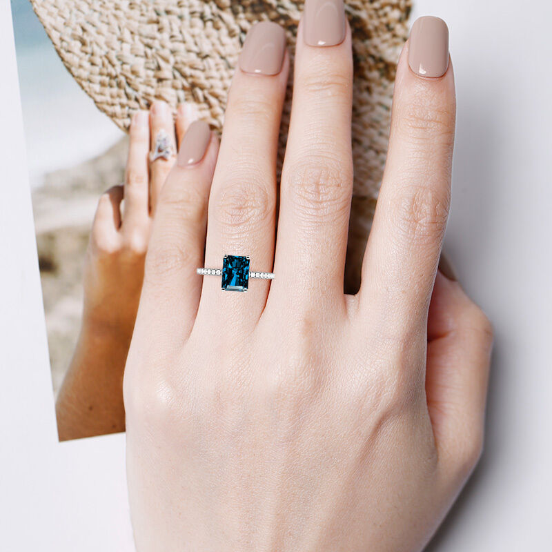 "Yours Completely" 4ct Radiant Cut Side Stone Engagement Ring