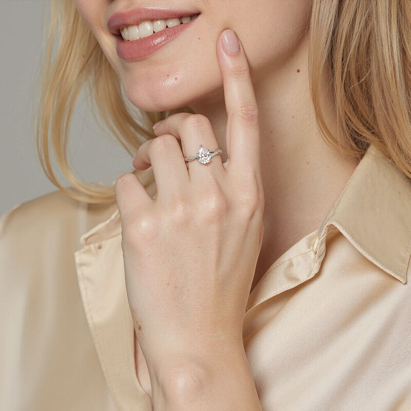 "Word of Honor" Pear Cut Side Stone Engagement Ring